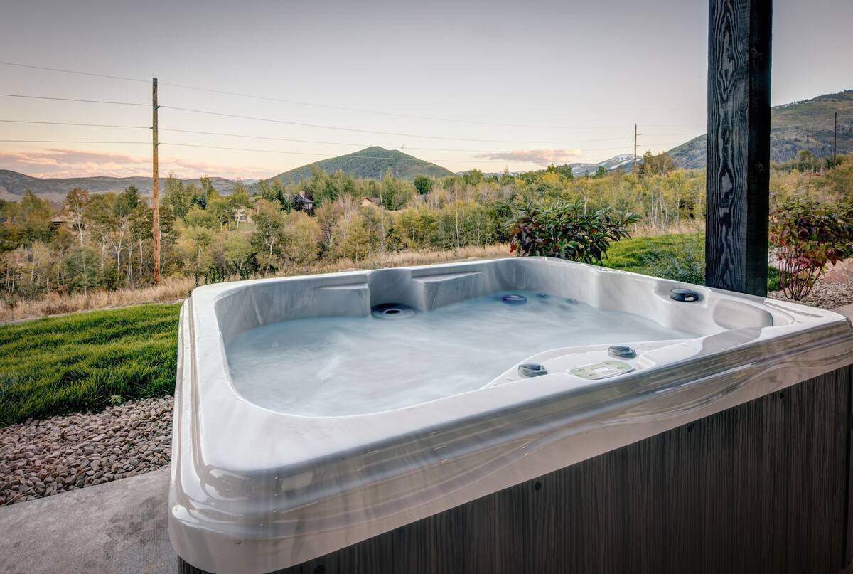 frost haven hot tub overlooking the view outside